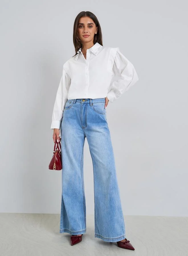 ستايلي بلوزة بقصة واسعة بياقة منمقة باللؤلؤ